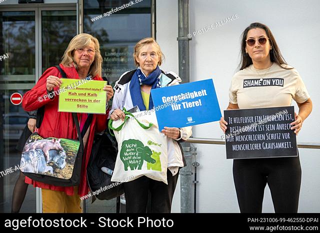 06 October 2023, Bavaria, Memmingen: Animal rights activists demonstrate against animal cruelty in front of the regional court
