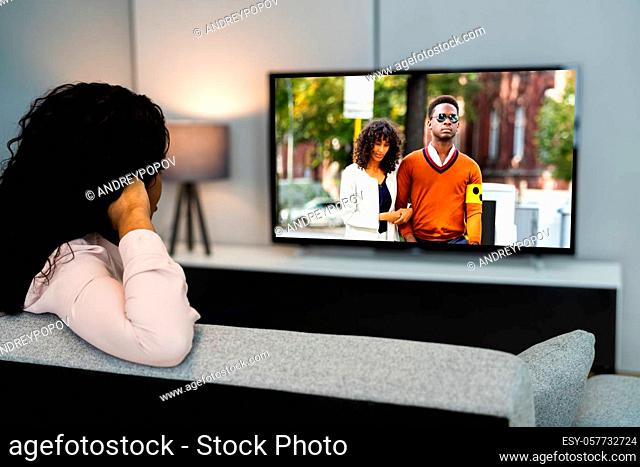 Watching TV Movie On Television In House