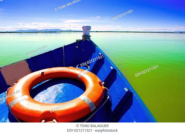 Blue boat sailing in Albufera lake of Valencia