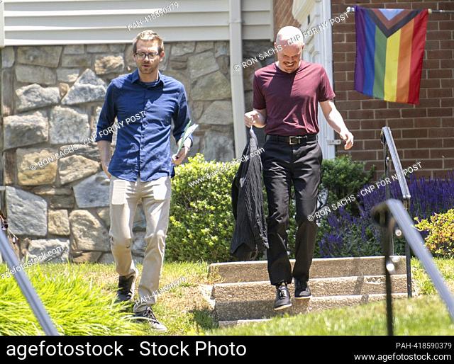 Samuel Brinton, 34, right, and his husband, Kevin Rieck, photographed outside their home in Rockville, Maryland on Friday, June 2, 2023