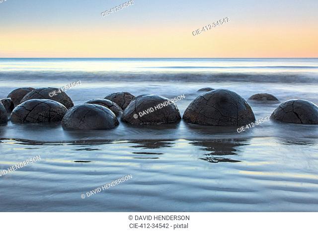 Tranquil seascape and boulders, Moeraki Boulders, South Island, New Zealand