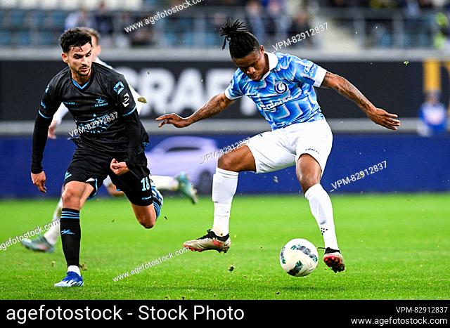 OHL's Florian Miguel and Gent's Gift Emmanuel Orban pictured in action during a soccer match between KAA Gent and OH Leuven, Thursday 21 December 2023 in Gent