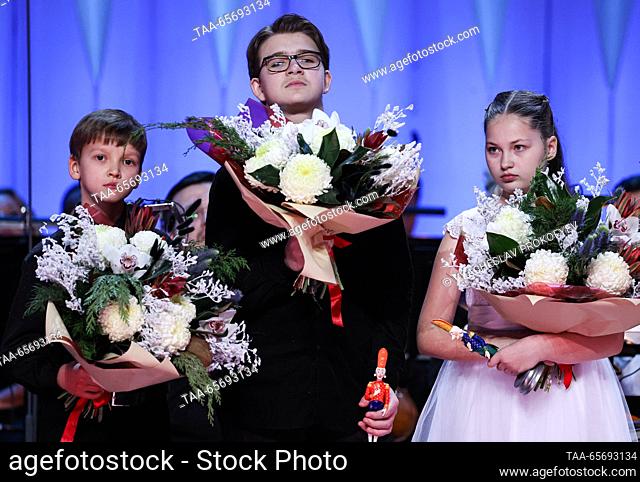 RUSSIA, MOSCOW - DECEMBER 12, 2023: Winners in the string category, violinist Alexander Kolesnikov (bronze), cellist Mikhail Vasilyev (gold)