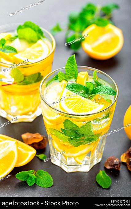 Lemon mojito cocktail with mint, cold refreshing drink or beverage