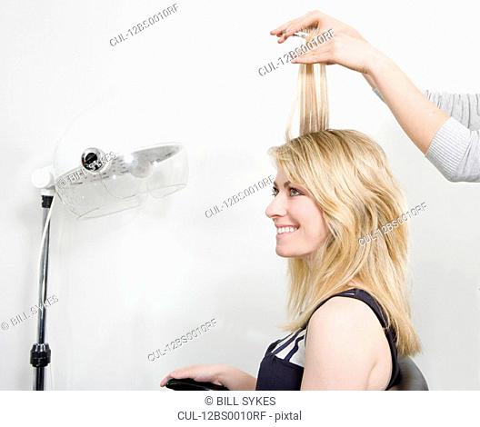 Woman having haircut