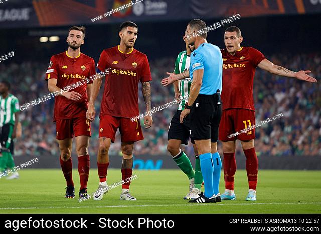 Seville, Spain. 13h, October 2022. Bryan Cristante (4), Lorenzo Pellegrini (7) and Andrea Belotti (11) of Roma seen with referee Tasos Sidiropoulos during the...