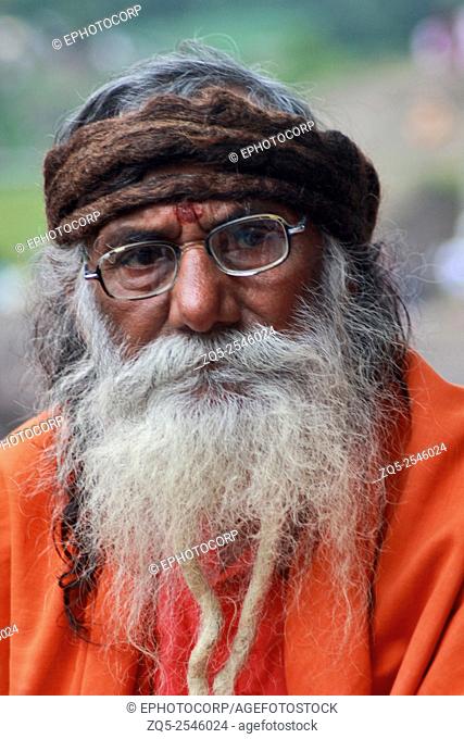 Sadhu with flowing white beard. Kumbh Mela, Nasik, Maharashtra, India