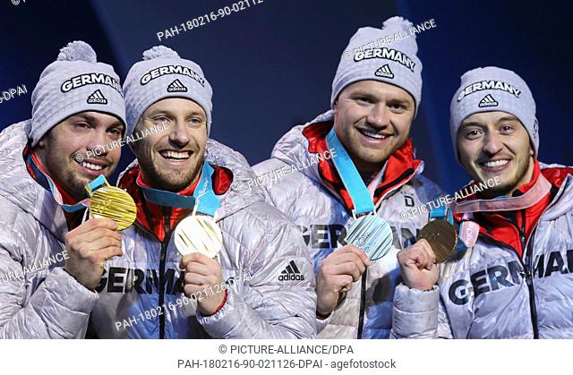 Tobias Wendl (left to right), Tobias Arlt (gold), Toni Eggert and Sascha Benecken (bronze) from Germany showing their medals during the award ceremony of the...