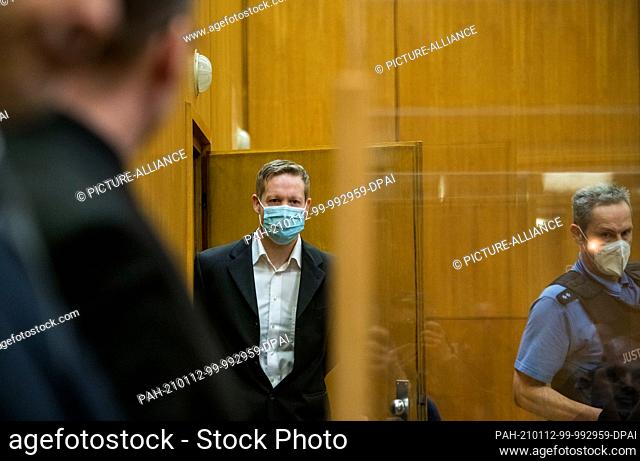 12 January 2021, Hessen, Frankfurt/Main: The main defendant Stephan Ernst (M) arrives at the Higher Regional Court for the continuation of his trial in the case...