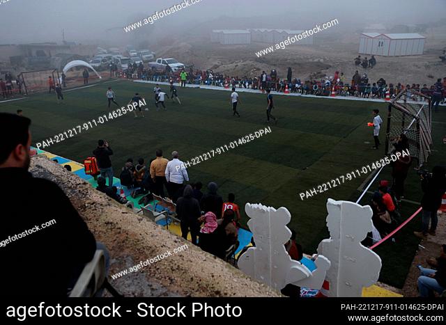 17 December 2022, Syria, Idlib: Children players take part in the final match of the World Cup of Camps organized by Violet Organization in conjunction with the...