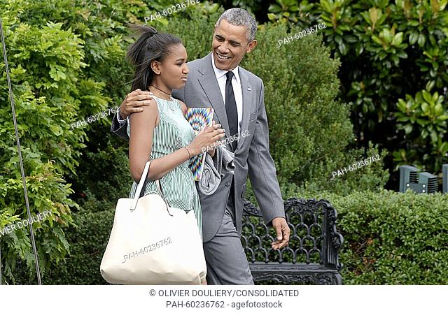 United States President Barack Obama with daughter Sasha leaves the residence to board Marine One at the White House July 17, 2015 in Washington, DC
