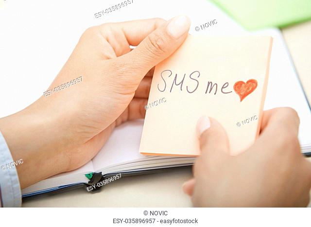 SMS me text on adhesive note
