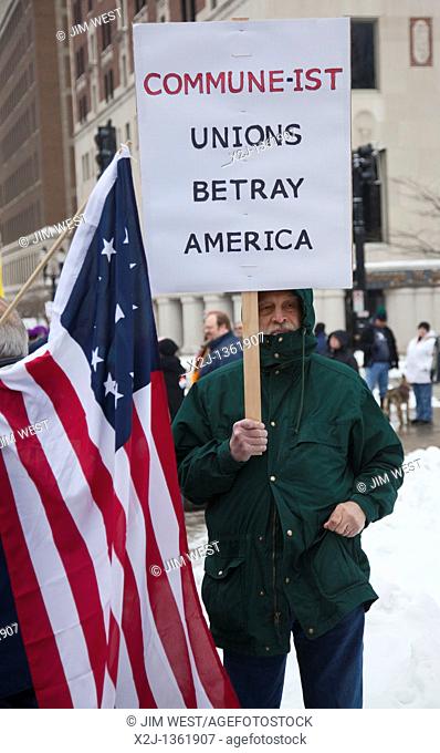 Lansing, Michigan - An anti-union protester near a union rally at the Michigan state capitol in support of public employees in Wisconsin who are fighting to...