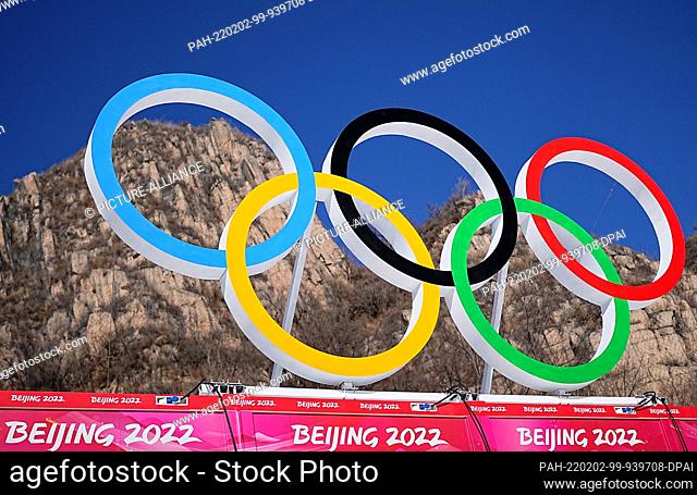 02 February 2022, China, Yanqing: In the finish area of the ski alpine course in the National Ski Alpine Center are the Olympic rings