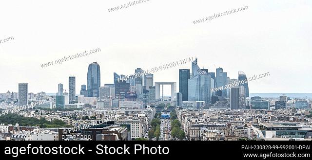 SYMBOL - 23 August 2023, France, Paris: View from Arc de Triomphe de l'Étoile to La Défense banking district. Photo: Silas Stein/dpa