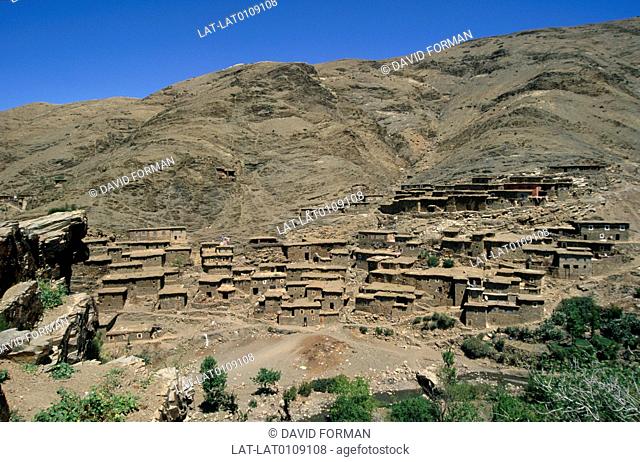 There is a traditional fortified town or group of buildings on the hillside at Tizi N'Tichka, a traditional Kasbah settlement in the mountain region