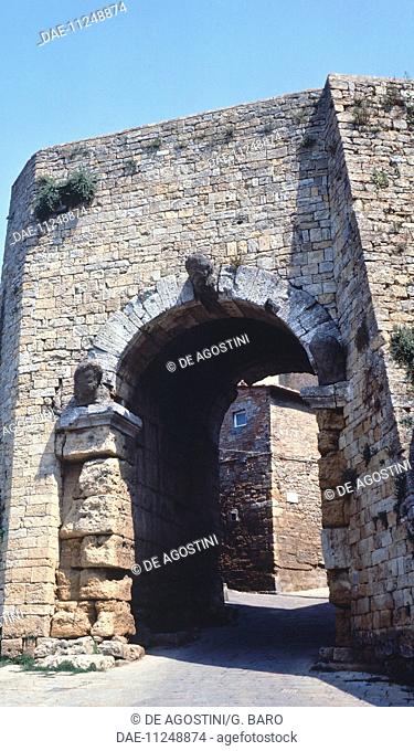 Porta all'Arco or Etruscan arch, with piers and heads of Etruscan gods, later restored in Roman and Medieval age, Volterra (Tuscany)