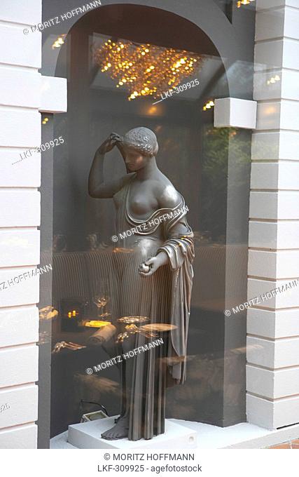 Statue in the window at the Hotel Giardino, Ascona, Ticino, Switzerland