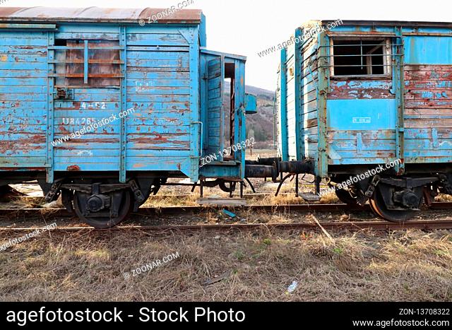 Abandoned old railway wagons at station, old train wagons in an abandoned station