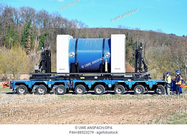 A Castor container is being transported by a truck to a ship at the nuclear power plant in Obrigheim, Germany, 27 February 2017