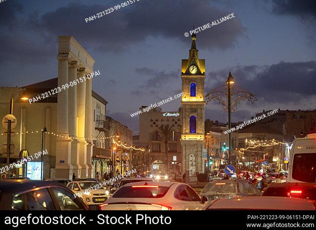 12 September 2022, Israel, Tel Aviv: The clock tower in the Jaffa district is illuminated in the evening. Photo: Christophe Gateau/dpa