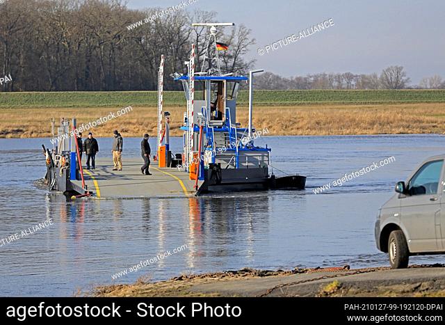 27 January 2021, Saxony-Anhalt, Sandau: After almost one year of standstill, the ferry ""Sandau"" transports customers across the Elbe again