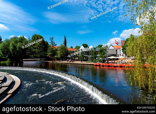 Odense, Denmark - 9 June, 2021: view of downtown Odense and the Odense River on a beautiful summer day