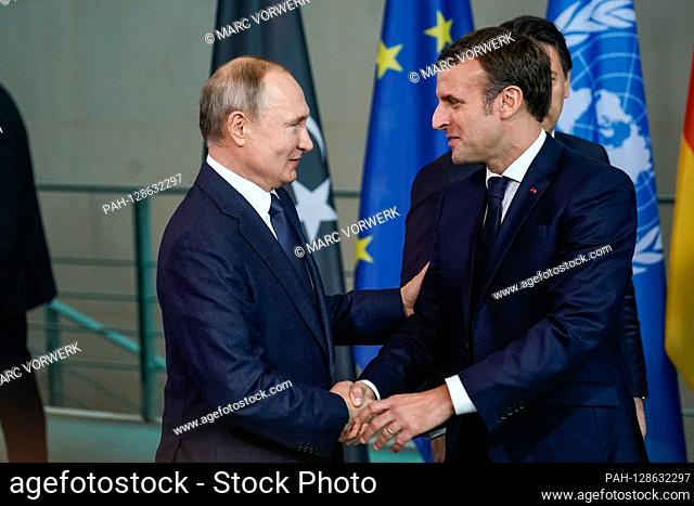 January 19, 2020, Vladimir Putin, President of Russia and Emmanuel Macron, President of France greet each other at the Berlin Libya Conference in the Federal...