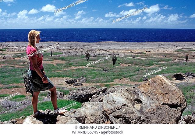 Woman and Desert landscape, Bonaire, Washington Slagbaai National Park, Netherlands Antilles, Bonaire