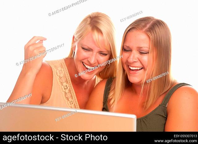 Two Laughing Women Using Laptop Isolated on a White Background