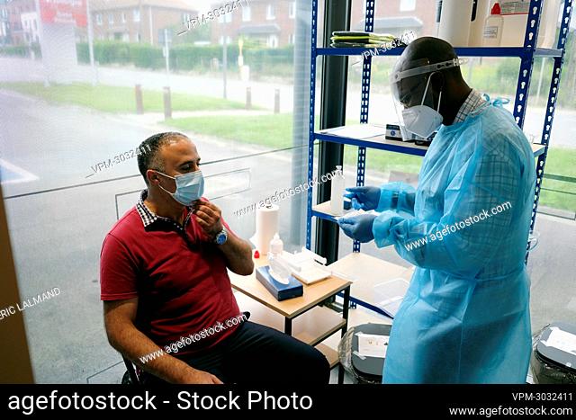Illustration picture shows the test area at pharmacy Servais in Jodoigne, Monday 12 July 2021. As of today, people are able to have a rapid antigen test carried...