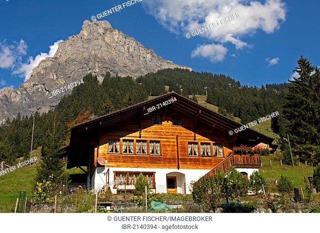 Modern home in the Swiss chalet-style at the foot of a mountain, Kandersteg, Bernese Oberland, Switzerland, Europe