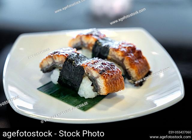 Unagi eel sushi, japanese food traditional cuisine, on white plate