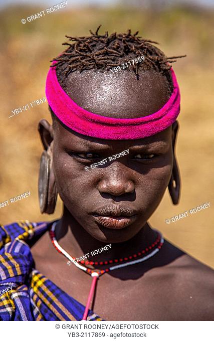 Portrait Of A Mursi Girl, Mursi Tribal Village, The Omo Valley, Ethiopia