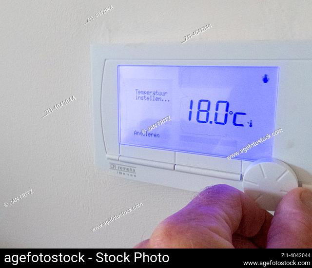 controlling central heating temperature by hand