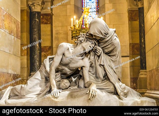 Mary Jesus Pieta Statue Candles Cathedral Saint Mary Mejor Catholic Church Marseille France Mary with Jesus body after crucifixion Church constructed 1800s