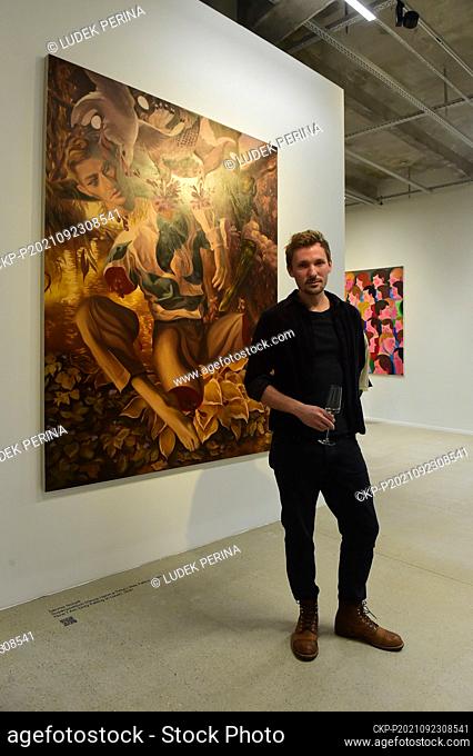 German painter Dennis Scholl poses in front of his painting Superposition (Once Upon a Time I Was Falling Apart, Now I Am Only Falling in Love) during the...