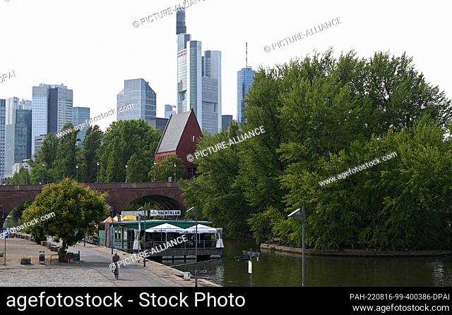 PRODUCTION - 13 July 2022, Hessen, Frankfurt/Main: Hidden among trees, the Kunsthalle Portikus stands on a small island on the Main River by the Old Bridge