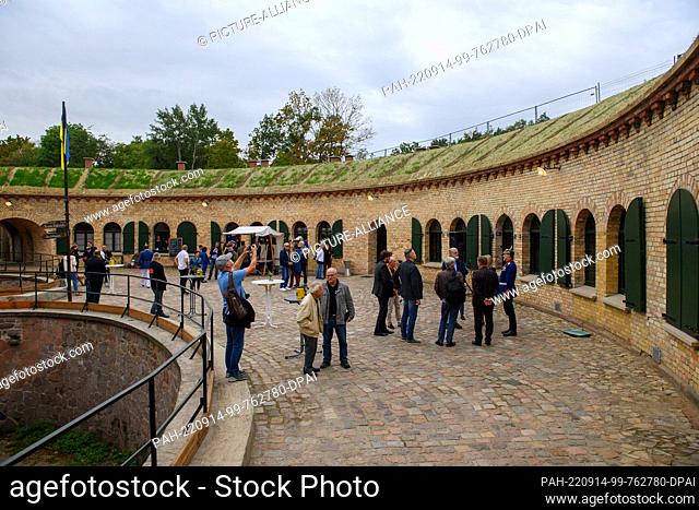 14 September 2022, Saxony-Anhalt, Magdeburg: Visitors to ""Ravelin 2"" look at the throat casemate of the fortress. Renovation work on the structure