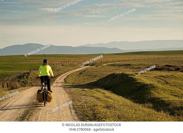 Bike traveller in Alcañizo, Toledo province, Castile LaMancha, Spain