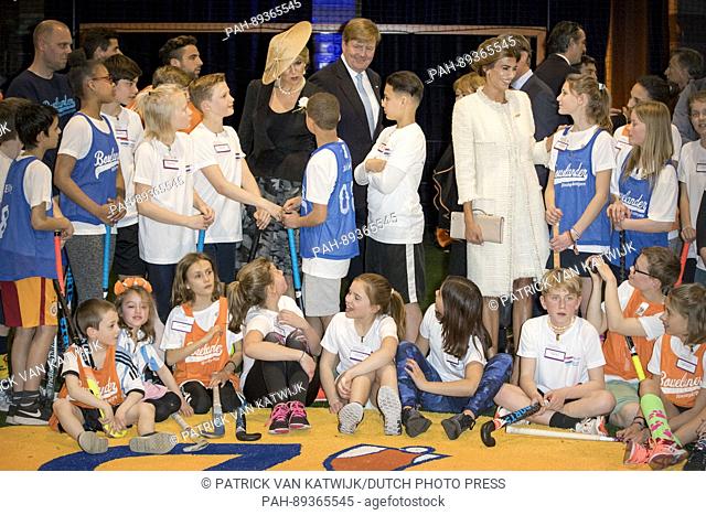 King Willem-Alexander and Queen Maxima of The Netherlands and President Maurico Macri and his wife Juliana Awada of Argentina visit the Hockey Clinic in...