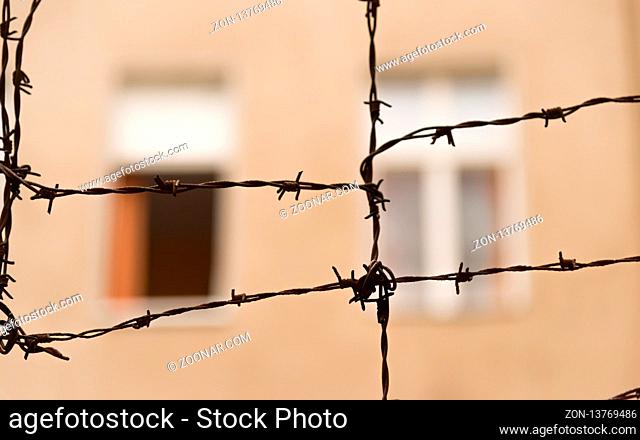 barbed wire inBarbed wire in front of an open window