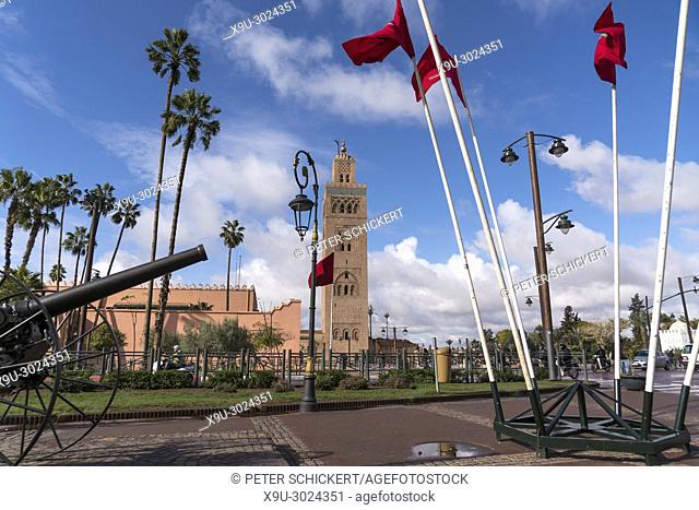 moroccan flags, canon and Koutoubia Mosque minaret, Marrakesh, Kingdom of Morocco, Africa