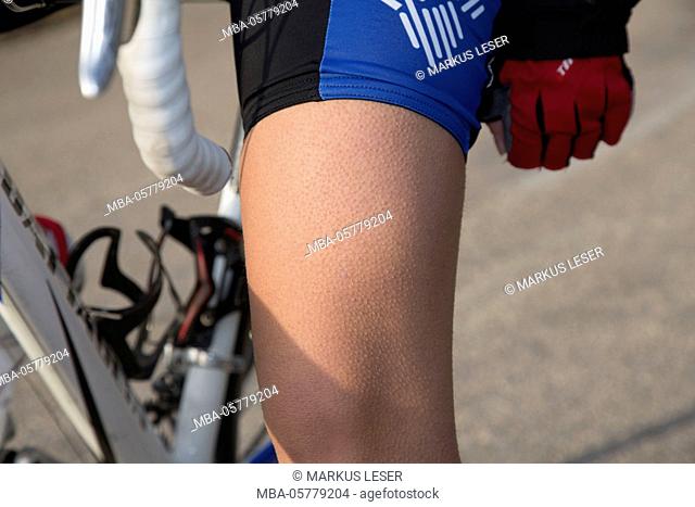 Sporty cyclist (female) is cycling to the Santuari de Cura, Majorca, the Balearic Islands, Spain