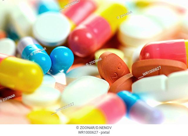 Colored capsules and tablets