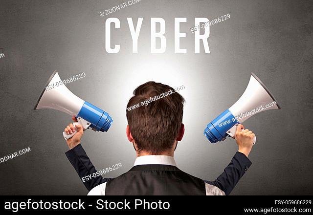 Rear view of a businessman with CYBER inscription, cyber security concept
