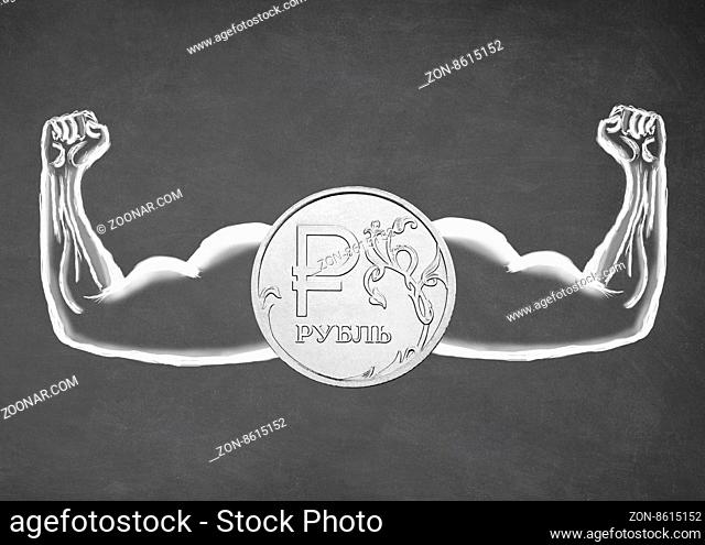 Strong Ruble. Financial concept. Drawn muscle on blackboard. Closeup