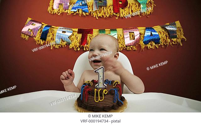Time lapse of a baby eating their first birthday cake