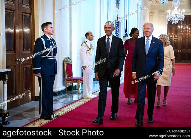 United States President Joe Biden, former US President Barack Obama, first lady Jill Biden, and former first lady Michelle Obama arrive prior to the official...