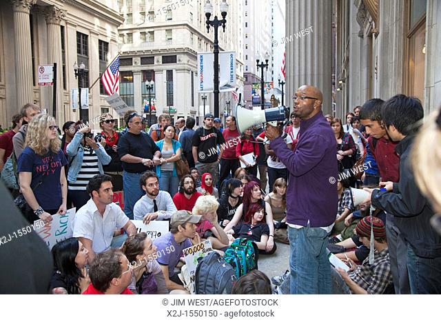 Chicago, Illinois - 'Occupy Chicago' members protesting economic inequality hold a daily general assembly on the sidewalk in the financial district  The...